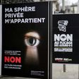 A Geneva campaign poster reads "My privacy belongs to me" as Swiss voters prepare to have their say on insurance surveillance
