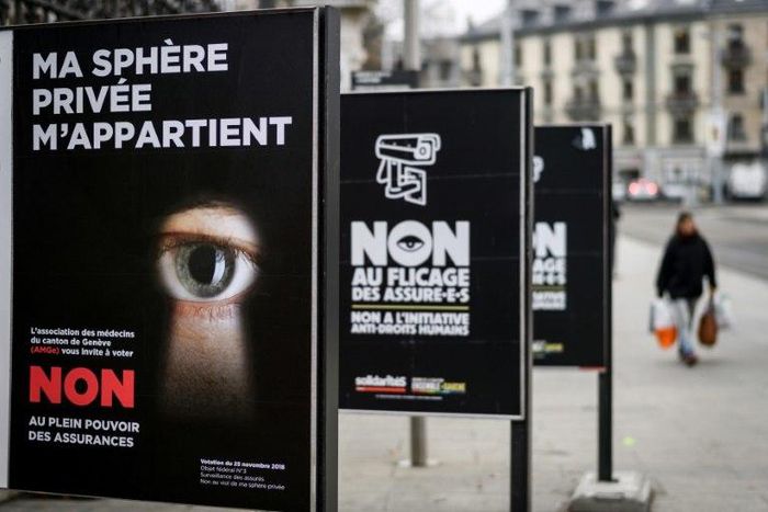 A Geneva campaign poster reads "My privacy belongs to me" as Swiss voters prepare to have their say on insurance surveillance