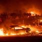Vehicles and homes have been destroyed by the "Camp Fire" in Paradise, California