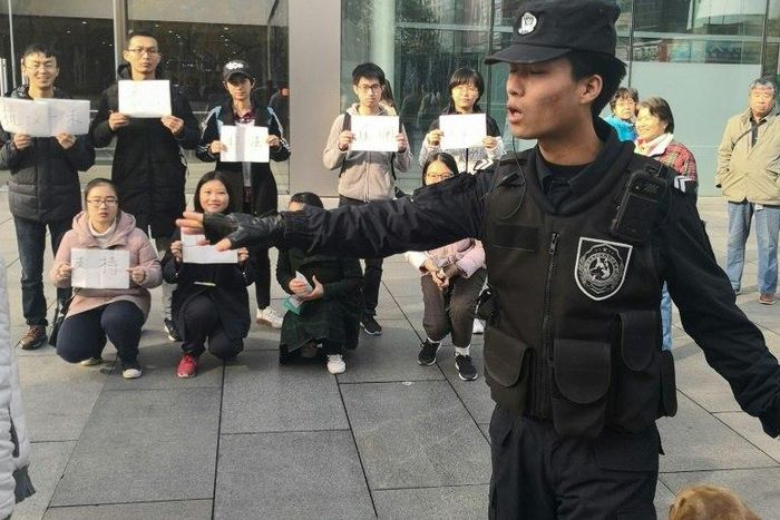 Any hint of campus activism in China sparks deep concern among authorities. This picture from November 8 shows demonstrating students outside an Apple Store in Bejing