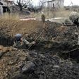 Ukrainian troops are positioned in the ruins of eastern Ukraine's flashpoint village of Shyrokyne, one kilometre from the frontline