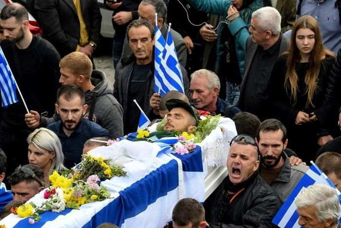 Hundreds of mourners flocked by bus and car to Bularat for the funeral, some chanting "Konstantinos, you are alive and leading us!"
