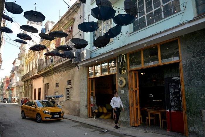 A taxi arrives at a private restaurant in Havana, Cuba, where entrepreneurs will soon be subjected to tougher restrictions