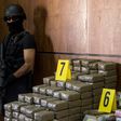 A picture taken on October 4, 2017, shows seized drugs and weapons on display at the Central office of Criminal investigation in the Moroccan city of Marrakesh