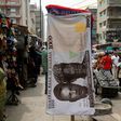 A towel with a print of the Nigerian naira is displayed for sale at a street market in the central business district in Nigeria's commercial capital Lagos February 4, 2016.
