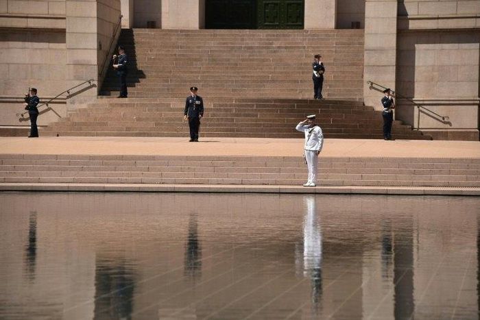 Members of the Australian armed forces played the Last Post as war veterans gathered at the ANZAC war memorial in Sydney