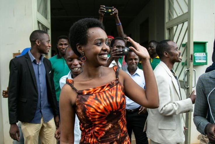 Diane Rwigara waves as she leaves the High Court on December 6 after judges dropped charges against her. The prosecution says it will appeal.