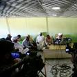 Journalists gather at a press conference by Idris Suleman, a senior official from the Popular Congress Party, in Khartoum on December 26, 2018
