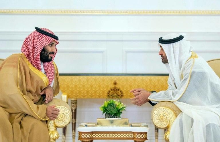 A handout picture provided by the Saudi Royal Palace on November 22, 2018, shows Saudi Crown Prince Mohammed bin Salman (L) meeting with Abu Dhabi's Crown Prince Sheikh Mohamed bin Zayed Al-Nahyan, upon the former's arrival in Abu Dhabi