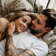 ___9125339___2018___11___21___8___high-angle-view-of-loving-young-couple-lying-on-bed-royalty-free-image-1032305820-1542739698