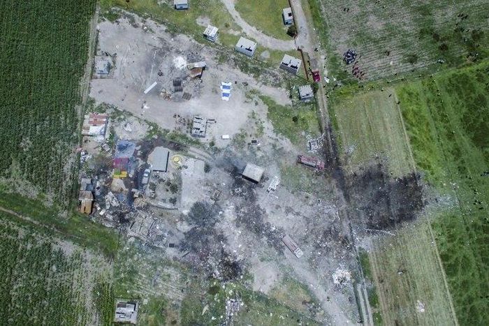 At least two dozen people died in a series of fireworks explosions in July in the town Tultepec, shown here