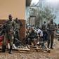 Armed forces members in DR Congo guard the entrance to the Independent National Election Commission (CENI) ahead of the presidential ballot
