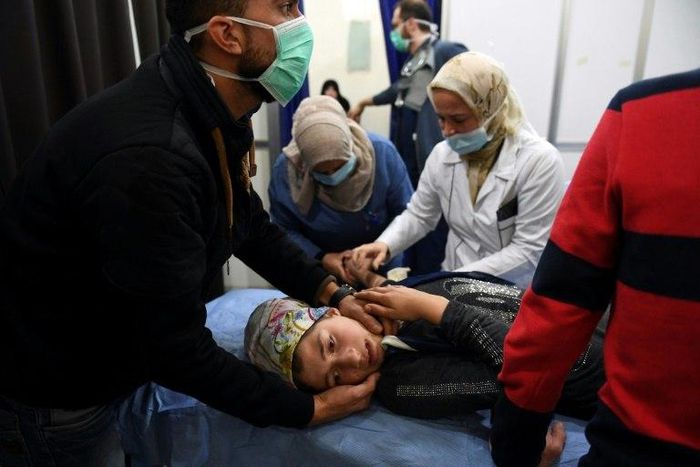 A Syrian girl receives treatment on November 24, 2018 at a hospital in Aleppo where the regime accused armed groups of carrying out a "toxic gas" attack