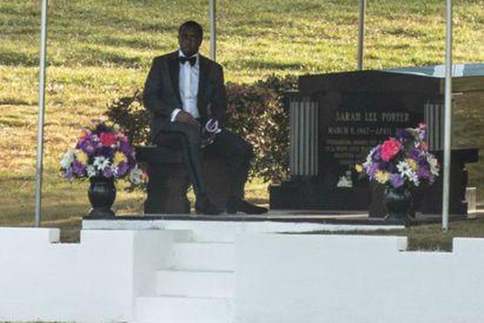 Diddy is spotted at the graveside where ex-girlfriend Kim Porter was buried.