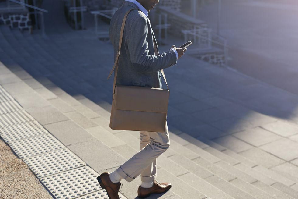 ___9155595___2018___11___30___22___businessman-walking-on-staircase-with-bags-royalty-free-image-668948552-1543598250