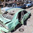 The aftermath of a suicide car bombing in front of a police station in the Iranian city of Chabahar on December 06, 2018