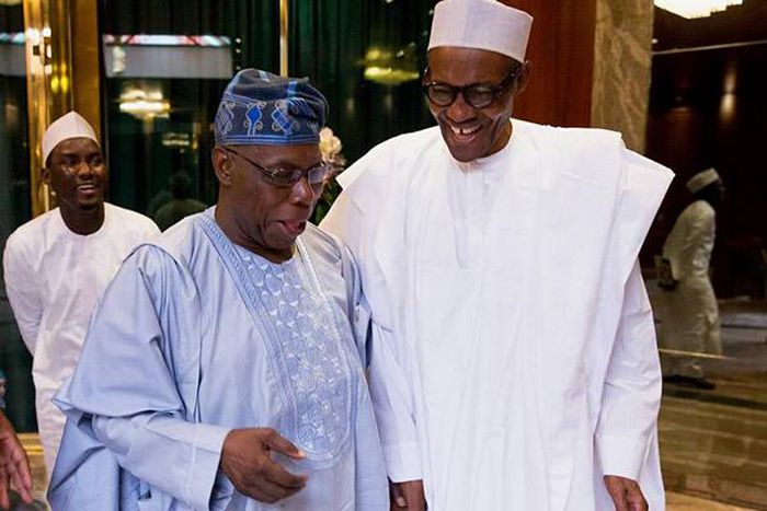Former President Olusegun Obasanjo (L) with President Buhari (R) at the State House, Abuja (Punch)