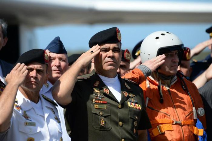 Venezuelan Defence Minister Vladimir Padrino (C) after the arrival of two Russian strategic long-range heavy supersonic bomber aircraft just north of Caracas, on December 10, 2018: Colombia dubs the move "provocative"
