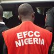 An EFCC officer during a raid