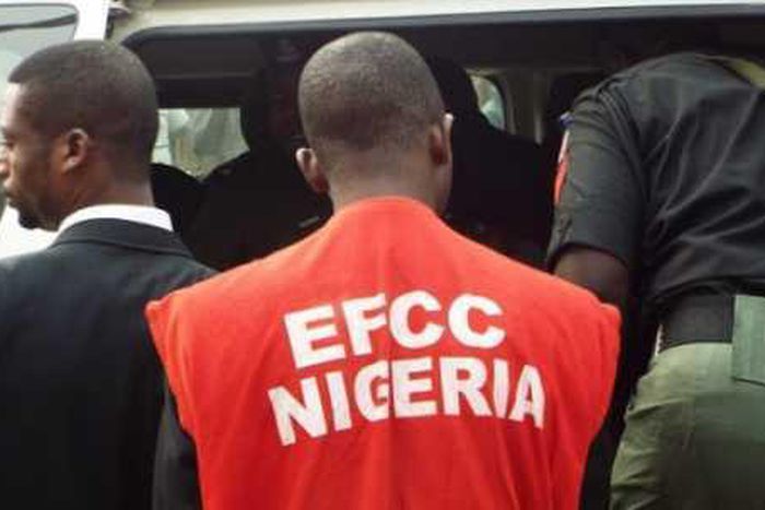 An EFCC officer during a raid