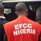 An EFCC officer during a raid