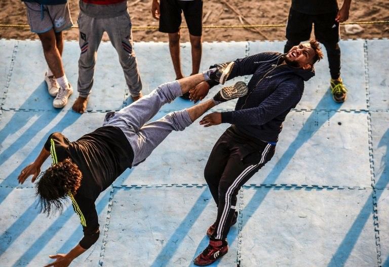 US wrestling is aired in cafes in working-class Egyptian neighbourhoods