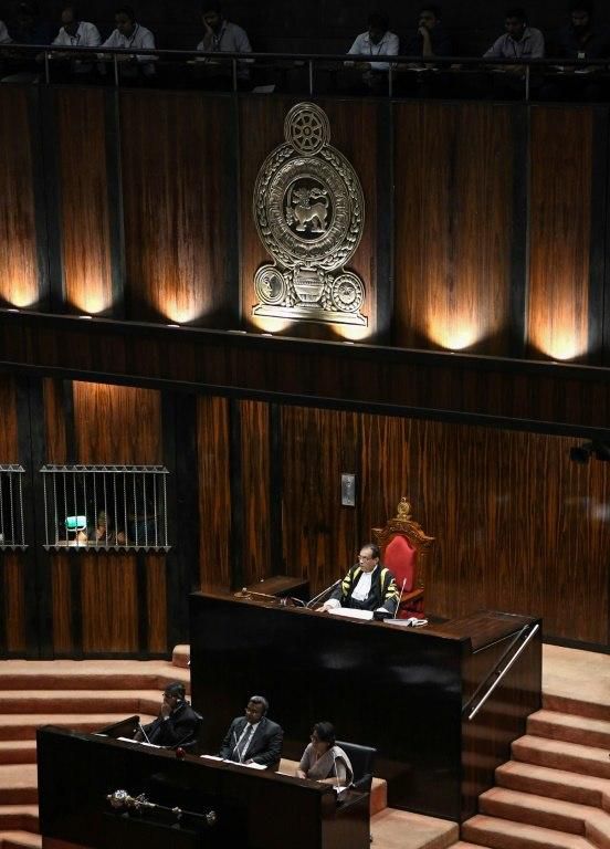 Several Rajapakse ministers accused Sri Lanka's parliament speaker, Karu Jayasuriya, of violating parliamentary norms by holding the crucial no-confidence vote