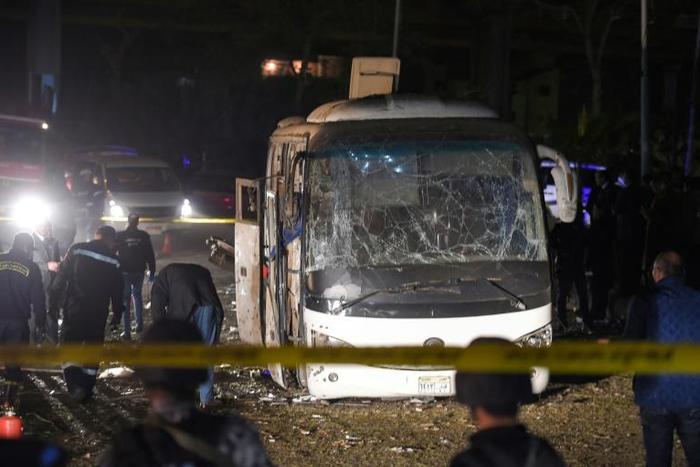 This picture taken on December 28, 2018 shows the scene of an attack on a tourist bus near the Giza Pyramids outside Cairo