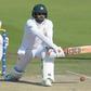 Pakistani batsman Azhar Ali (R) plays a shot against New Zealand December 5, 2018