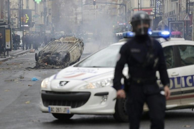 Running riots with police in Paris over the weekend left cars burned out and shops vandalised