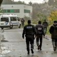 Some 200 police were involved in the raids in Grande Synthe