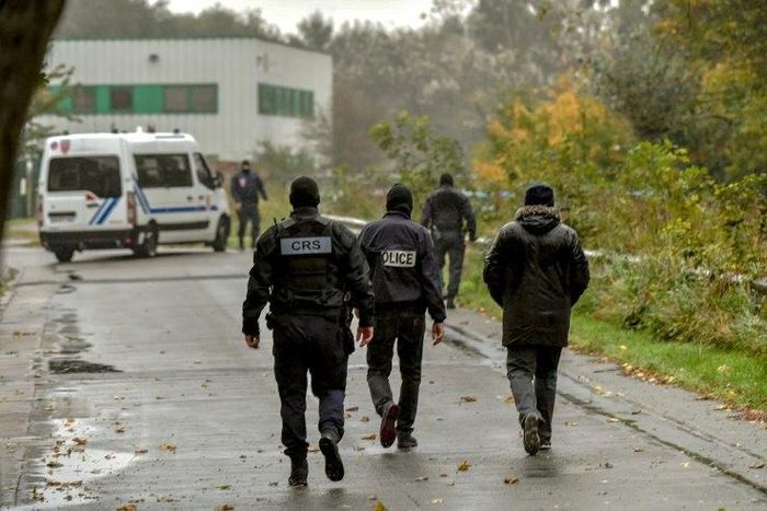 Some 200 police were involved in the raids in Grande Synthe