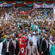 President Buhari greeting APC supporters at the campaign rally in Ekiti