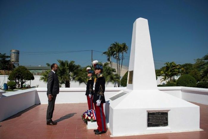 Prime Minister Edouard Philippe (L) lays a wreath at the French memorial in Dien Bien Phu, the battle that spelled the end of France's colonial rule in Indochina