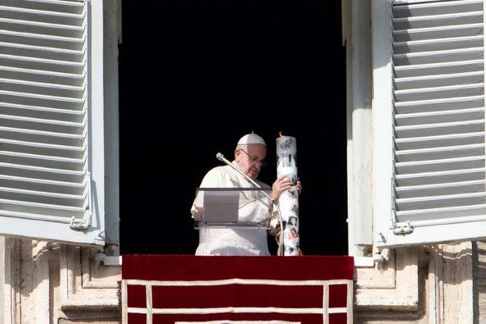 "Let these flames of hope dispel the shadows of war!" Pope Francis said