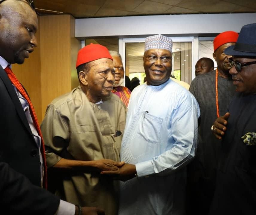 Atiku Abubakar shares a hug with Professor Ben Nwabueze, an elder statesman in the southeast region