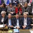 May said she would delay Tuesday's vote, admitting her Brexit deal would be rejected in it