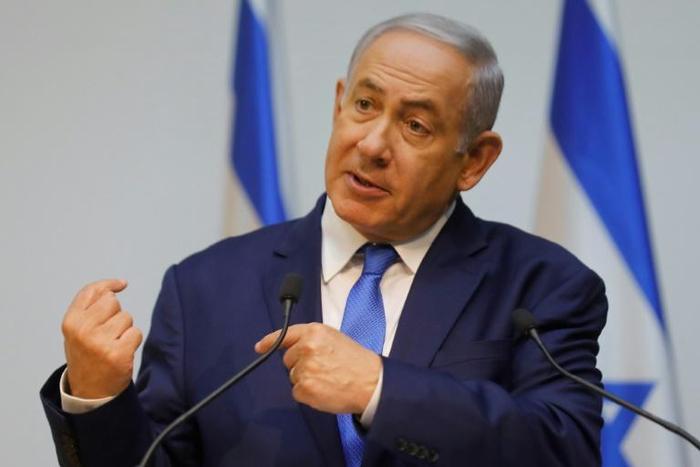 Coalition party heads in the government of Israeli Prime Minister Benjamin Netanyahu agree to hold early elections in April, seven months before they are due