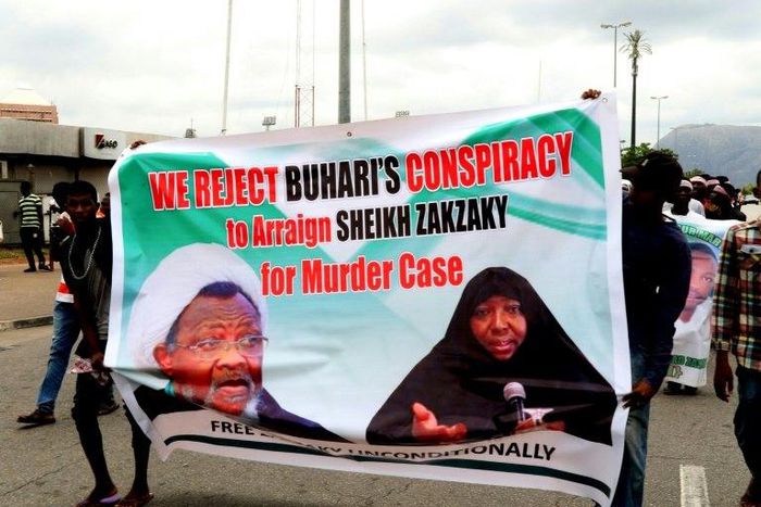 Supporters press for the release of Nigerian Shiite Muslim cleric Ibrahim Zakzaky on May 14, 2018, a day before his appearance in court to face criminal charges