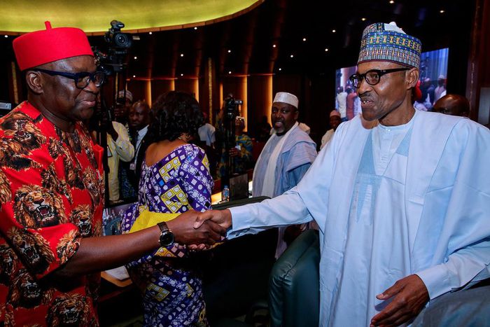 President Muhammadu Buhari shakes hands with Ekiti State governor, Ayodele Fayose