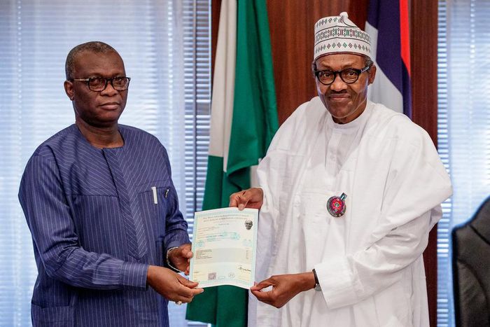 Buhari, being presented with an attestation certificate by the registrar of WAEC, Dr. Uyi Uwadiae on Friday, November 2, 2018, at the State House