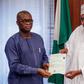 Buhari, being presented with an attestation certificate by the registrar of WAEC, Dr. Uyi Uwadiae on Friday, November 2, 2018, at the State House
