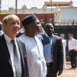 French Foreign Affairs Minister Jean-Yves Le Drian, left, with Burkina Faso's Foreign Affairs Minister Alpha Barry at the inauguration of an education and start-up incubator in Ouagadougou on October 19, 2018