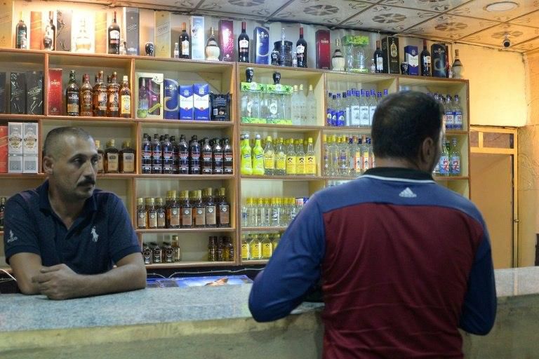 Shops selling alcohol must be a certain distance from homes, schools, places of worship, and government offices