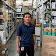 Denny Guevara, 26, has found work at a supermarket in Mexico; his next dream is to make enough money to send for the wife and three children he left behind in Honduras