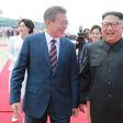 North Korean leader Kim Jong Un (R) will visit Seoul 'soon', according to the South's President Moon Jae-in (L)