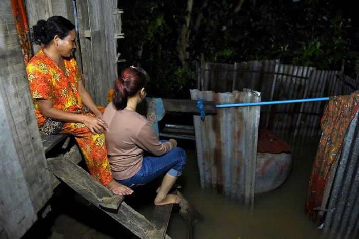 Nary (R) is back home in Cambodia with her mother now, but fears she may never see her son again after her marriage to a Chinese man collapsed