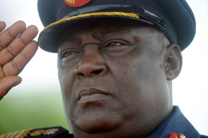 Five men suspected of ambushing and shooting dead retired Nigerian air chief marshall Alex Badeh (pictured February 2015) have been arrested