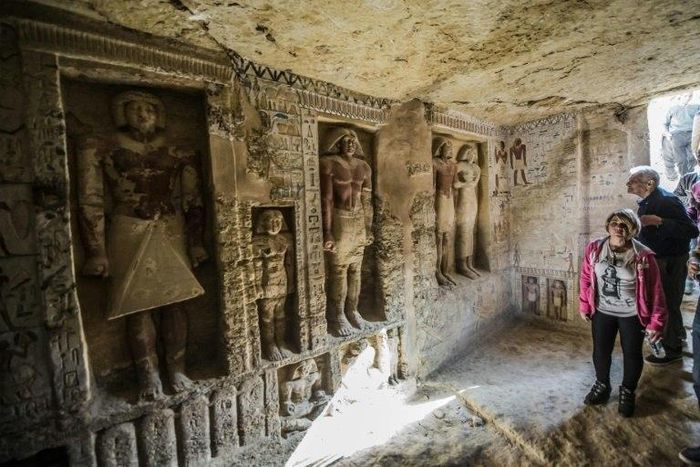 Guests enter a newly-discovered tomb at the Saqqara necropolis, 30 kilometres south of Cairo, belonging to the high priest "Wahtye" who served during the reign of King Neferirkare