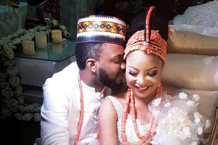 Linda Ejiofor and her "Tinsel" look like angels in sparkling white outfits they wore to their traditional wedding.